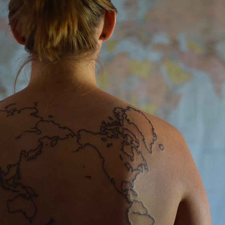 World Map Tattoo (15 Wonderful Ways to Track Your Travels).