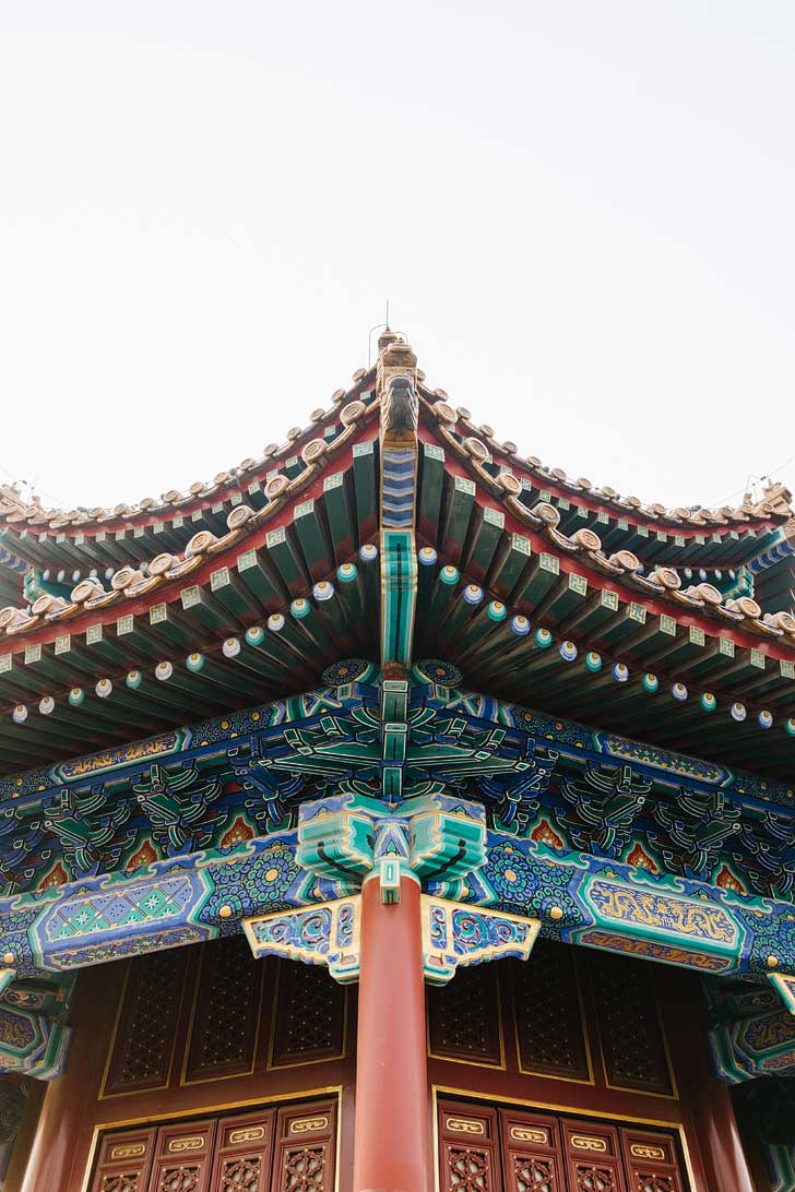 Jingshan Park Beijing China - Climb this artificial hill for an amazing view of Beijing and the Forbidden City. Be sure to visit the pavilions in the park for a close-up at Chinese architecture // localadventurer.com