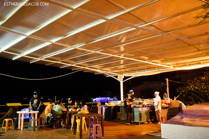 Eat fresh fish at the Puerto Ayora Santa Cruz fish market.