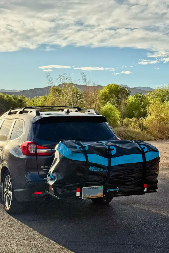 Mockins hitch carrier with cargo bag and license plate holder