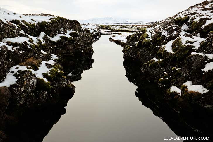 Silfra Fissure Snorkeling in Þingvellir National Park Iceland - Snorkel between the continental plates of Eurasia and North America. The underwater visibility is over 100 m and the water is pristine and drinkable during your dive or snorkel // localadventurer.com