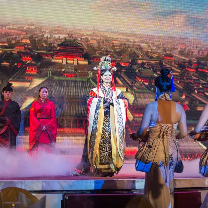 Dinner at the Imperial Cuisine Museum includes a show that with dancing, singing, and acrobatics. The costumes and story-telling are amazing. // localadventurer.com