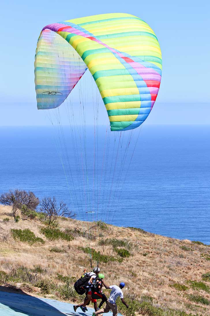 Cape Town Paragliding - one of the best things to do in Cape Town. You get a beautiful view Signal Hill, Lions Head, Table Mountain, and the ocean // localadventurer.com