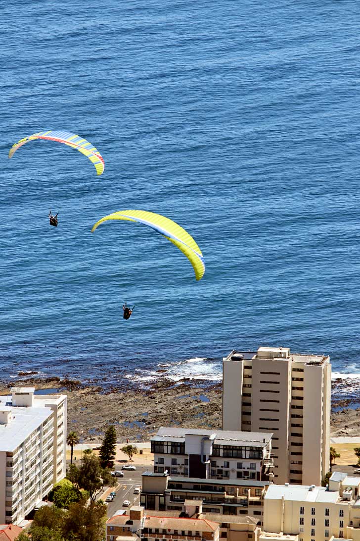 Paragliding Signal Hill Cape Town - one of the best things to do in Cape Town. You get a beautiful view Signal Hill, Lions Head, Table Mountain, and the ocean // localadventurer.com