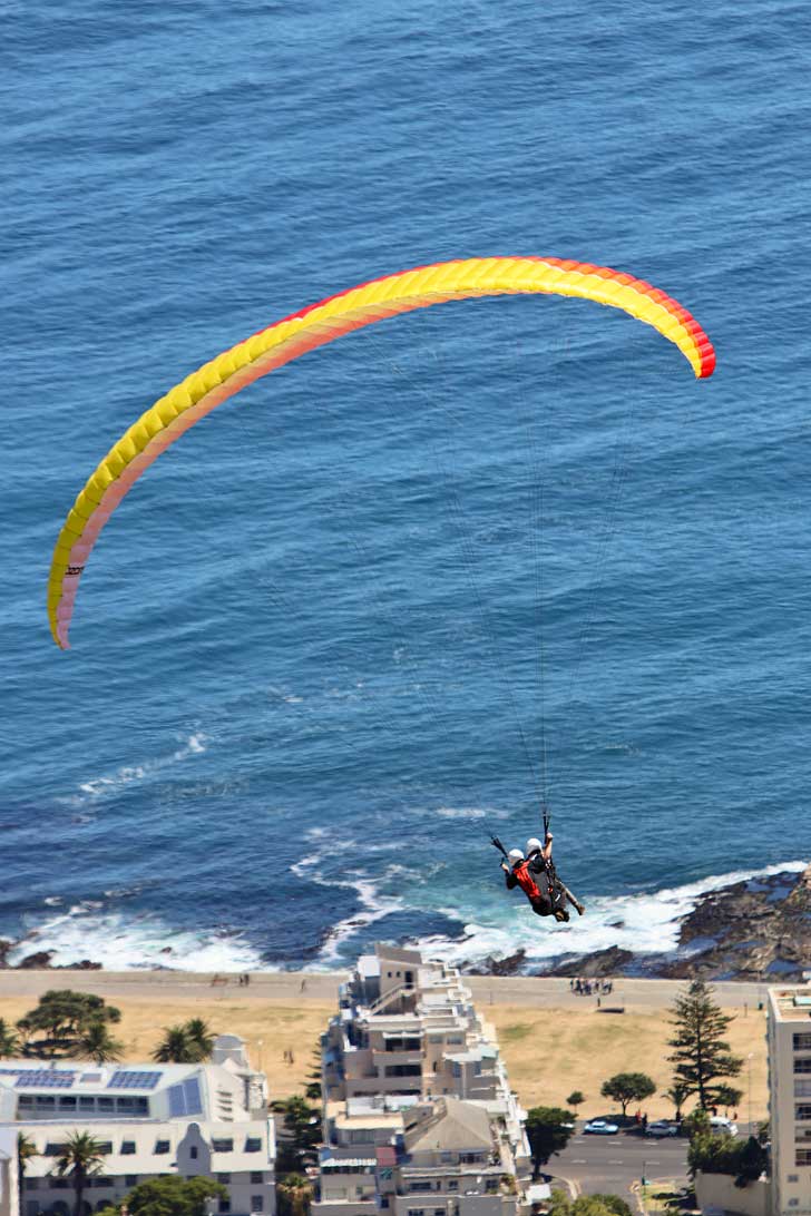 Paragliding Signal Hill Cape Town - one of the best things to do in Cape Town. You get a beautiful view Signal Hill, Lions Head, Table Mountain, and the ocean // localadventurer.com