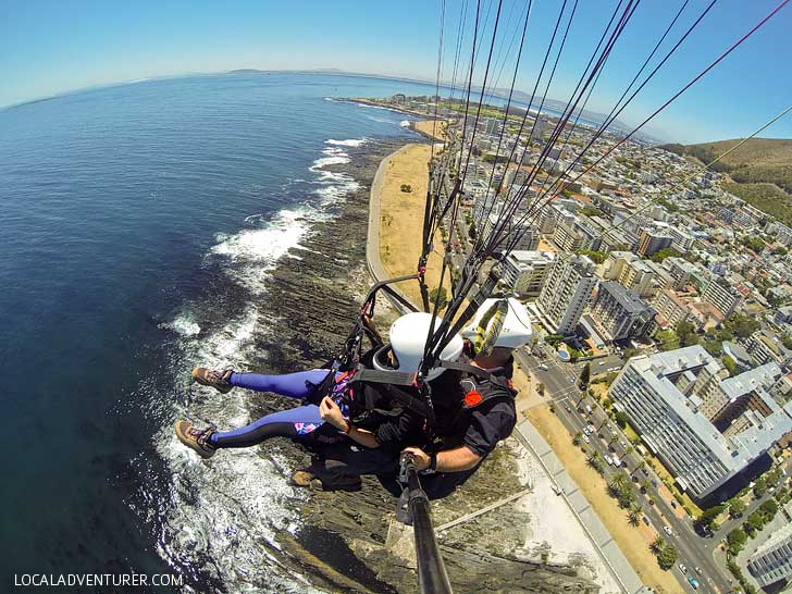 Cape Town Paragliding - one of the best things to do in Cape Town. You get a beautiful view Signal Hill, Lions Head, Table Mountain, and the ocean // localadventurer.com