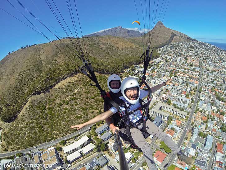 Paragliding Signal Hill Cape Town - one of the best things to do in Cape Town. You get a beautiful view Signal Hill, Lions Head, Table Mountain, and the ocean // localadventurer.com