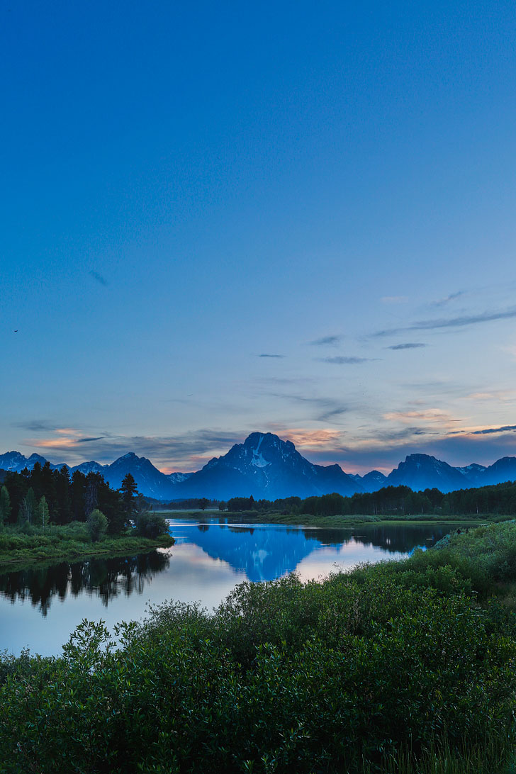 Take a scenic drive through the Teton Range with views of the winding Snake River (#1) + Check out the article on 11 incredible things to do in Grand Teton National Park, Jackson Hole, Wyoming - beautiful places, hikes, and epic adventures to add to your Wyoming Bucket List // Local Adventurer #wyoming #grandteton