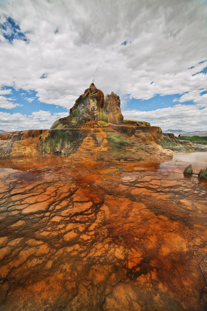 Visiting Fly Geyser in Nevada? Save this pin and check out how to book a tour. The fly geyser in nevada has always been on private property, but the new owners have recently opened it up nature walk tours. Learn what they are doing with the land at fly ranch, get photography tips, and a checklist of other items you should bring. // Local Adventurer #localadventurer #travelnevada #dfmi #nevada #flygeyser #blackrockdesert #desert